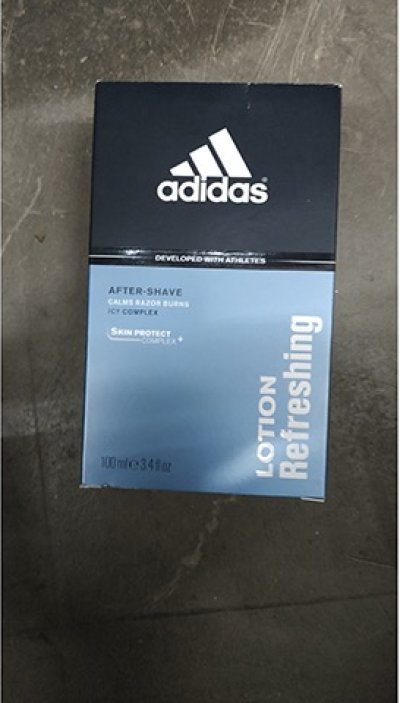 Černo-modrá krabička s logem Adidas