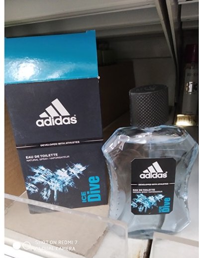 Černo-modrá krabička s logem Adidas