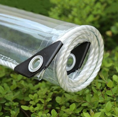 Role průhledné PVC plachty s oky v rozích
