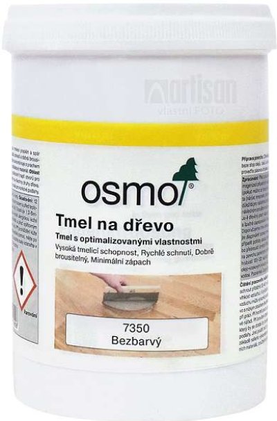 Bílá nádoba s tmelem na dřevo