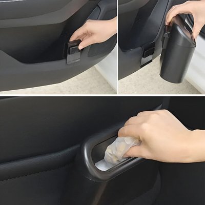 Černý odpadkový koš zaháknutý za kapsu ve dveřích auta