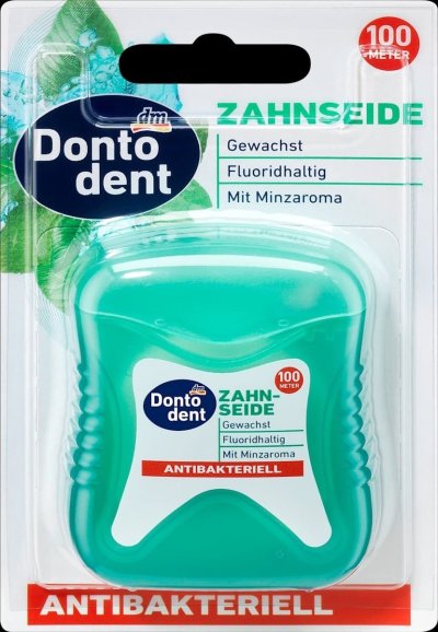 Zubní nit v produktovém obalu