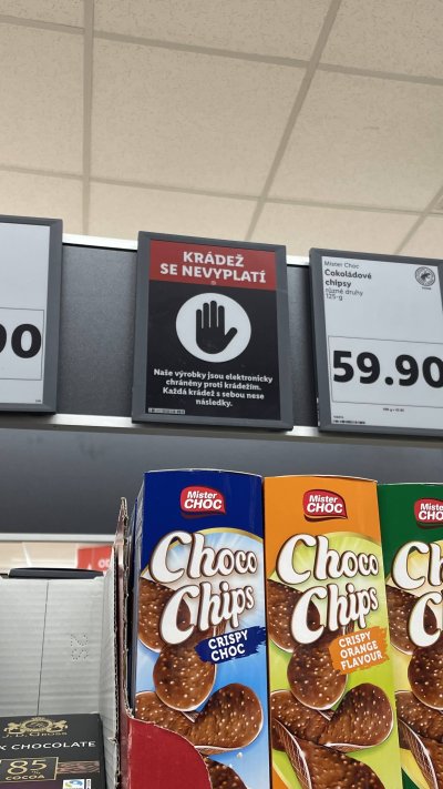 Cedulka varující před krádeží v supermarketu