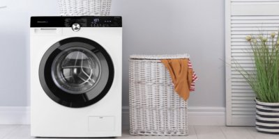 Sušička prádla PHILCO PDCI 10 D King v koupelně 