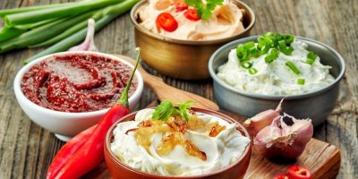 https://www.shutterstock.com/cs/image-photo/various-dip-sauces-on-wooden-table-320531906