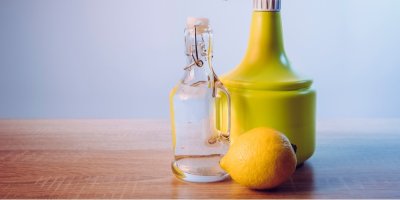 Citron, rozprašovač, láhev s průhlednou tekutinou