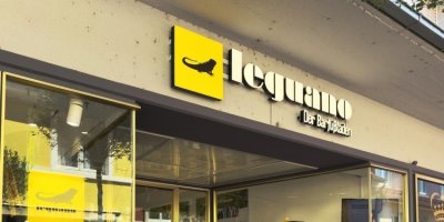 Budova s logem firmy Leguano