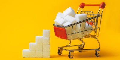 Nákupní vozík a kostky cukru