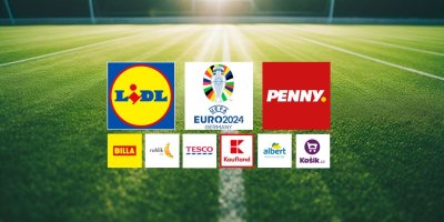 Pohled na fotbalový trávník a loga řetězců nabízejících speciální zboží v rámci akce EURO 2024